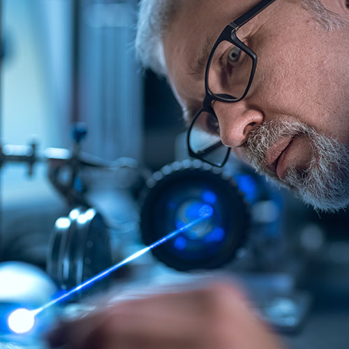 Man measuring with a laser 