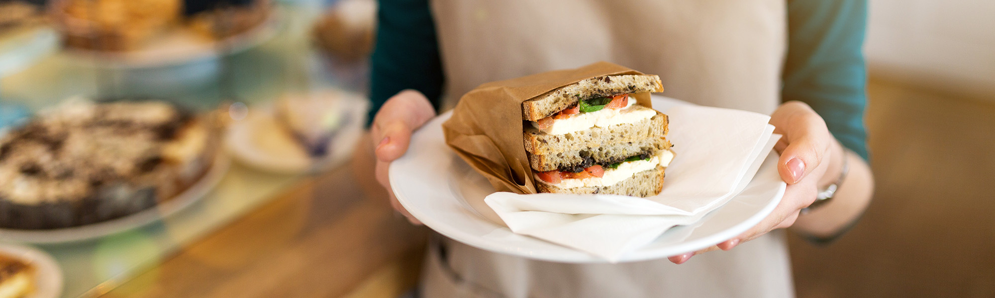 Woman holding a sandwich