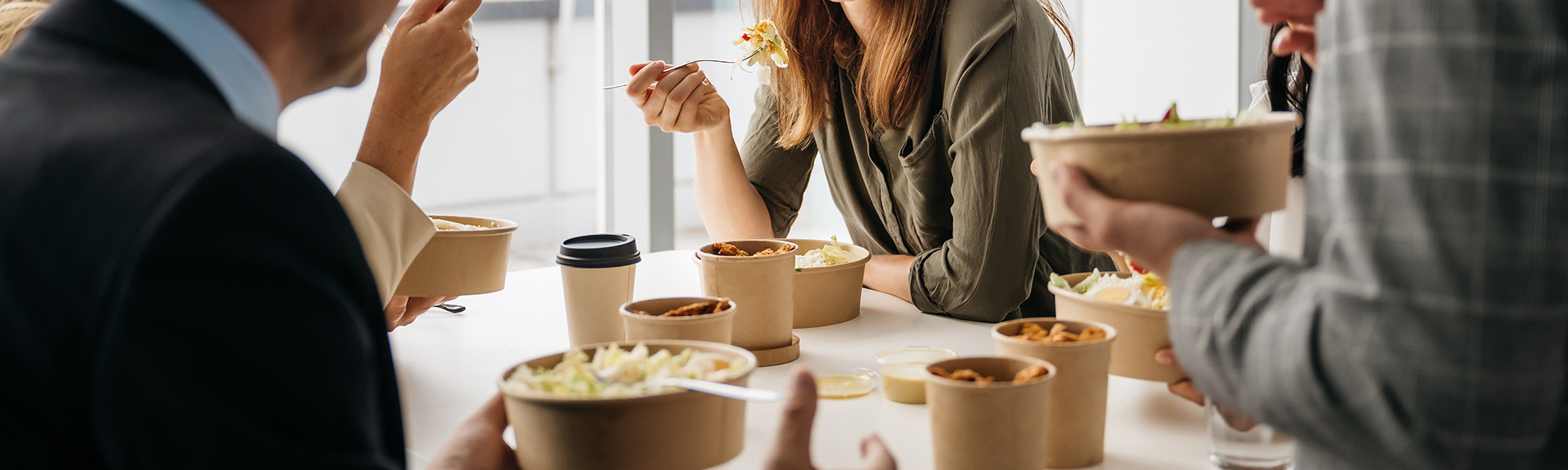 Colleagues having lunch together