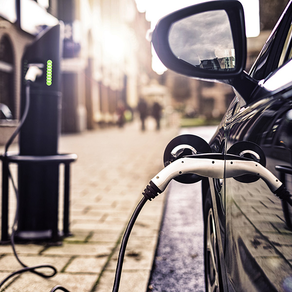 Electric car charging at a port