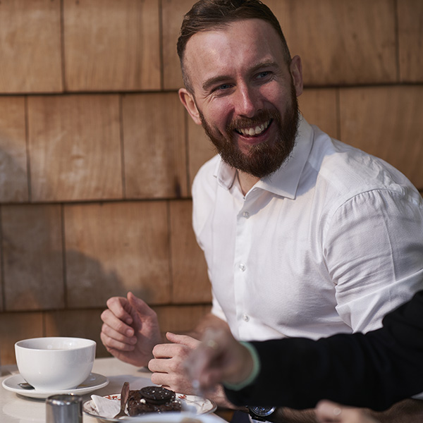 Man and woman having coffee in iCafe