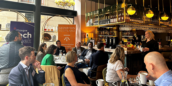 Group of people attending speed networking event