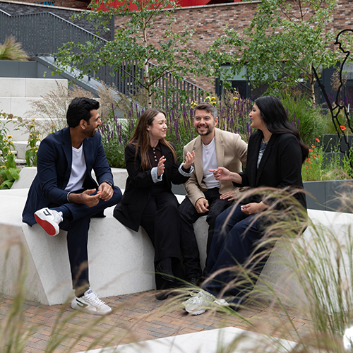 Colleagues sitting chatting