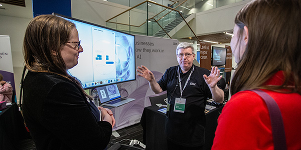 People speaking at an event